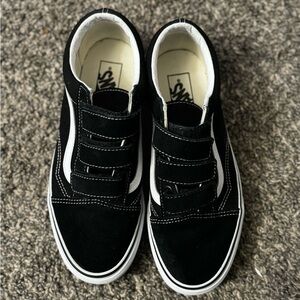 Like new black-and-white adult Velcro vans